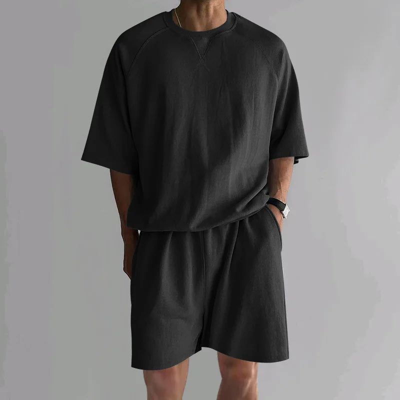 New 2026 Summer Men's Two Piece Sets Casual Loose Short Sleeve O Neck Tees and Shorts Tracksuits Men Stylish Solid Color Suits