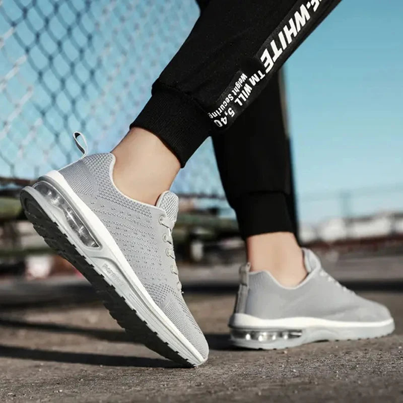 Hot Selling Large Size Running Shoes Lightweight Resilience Slip on Sneakers Mesh Air Cushion Casual Walking Shoes