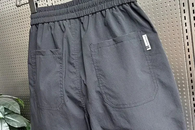 Summer Fashion New Men Breathable Casual Trousers Loose Tying Feet Versatile Simple Solid Color Harem Pants