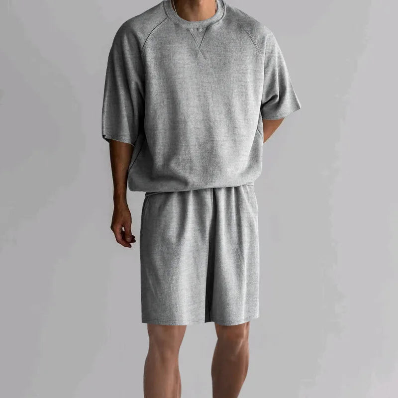 New 2026 Summer Men's Two Piece Sets Casual Loose Short Sleeve O Neck Tees and Shorts Tracksuits Men Stylish Solid Color Suits
