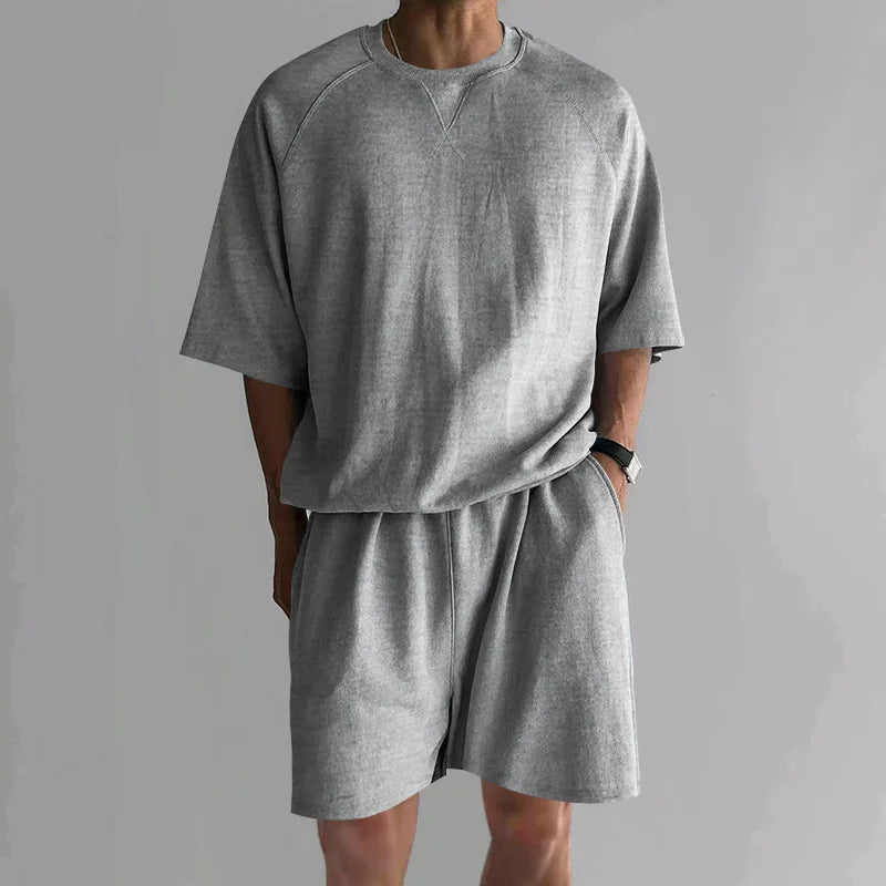 New 2026 Summer Men's Two Piece Sets Casual Loose Short Sleeve O Neck Tees and Shorts Tracksuits Men Stylish Solid Color Suits