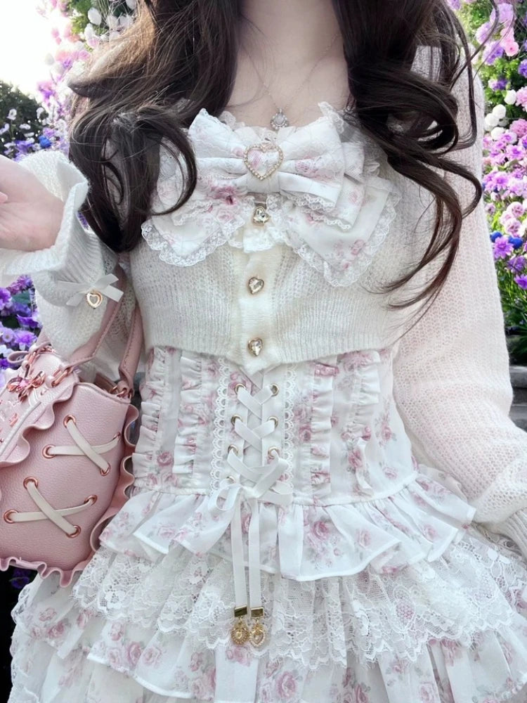 Lolita two-piece set in white with pink floral lace; ruffled collar bow and corset-style waist over a layered mini skirt