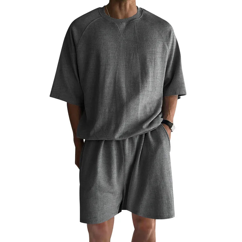 New 2026 Summer Men's Two Piece Sets Casual Loose Short Sleeve O Neck Tees and Shorts Tracksuits Men Stylish Solid Color Suits