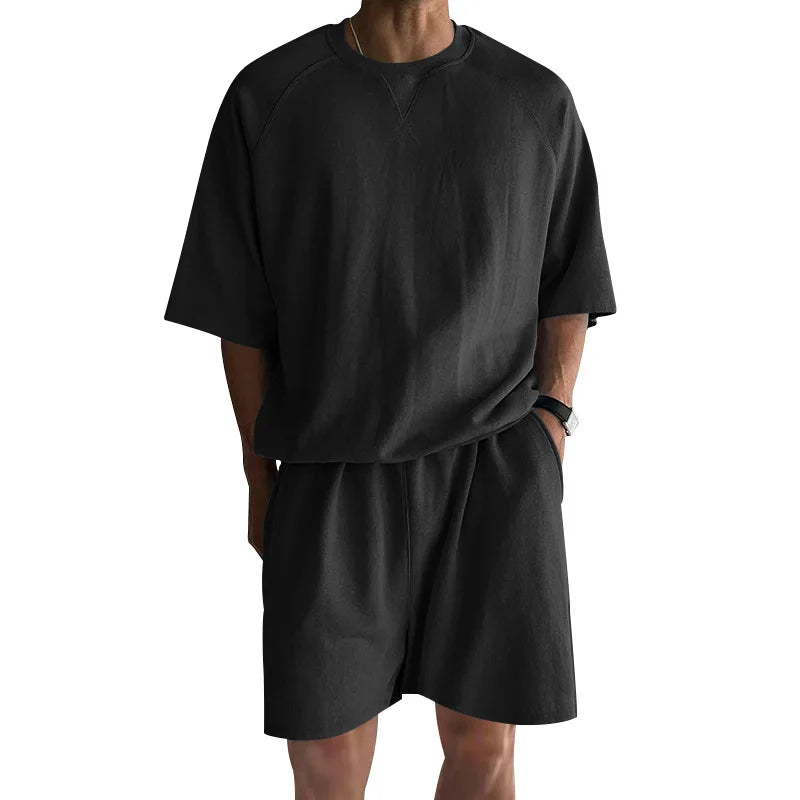New 2026 Summer Men's Two Piece Sets Casual Loose Short Sleeve O Neck Tees and Shorts Tracksuits Men Stylish Solid Color Suits