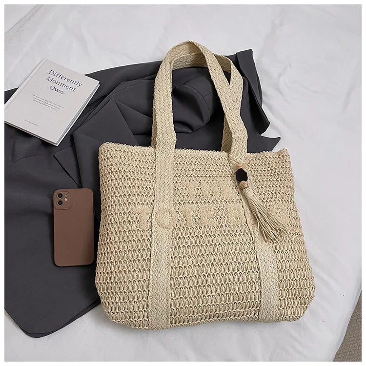 Straw woven bag, women's new versatile large capacity commuting tote bag, fashionable and stylish vacation bag