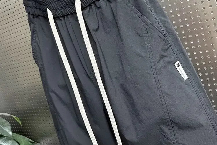 Summer Fashion New Men Breathable Casual Trousers Loose Tying Feet Versatile Simple Solid Color Harem Pants
