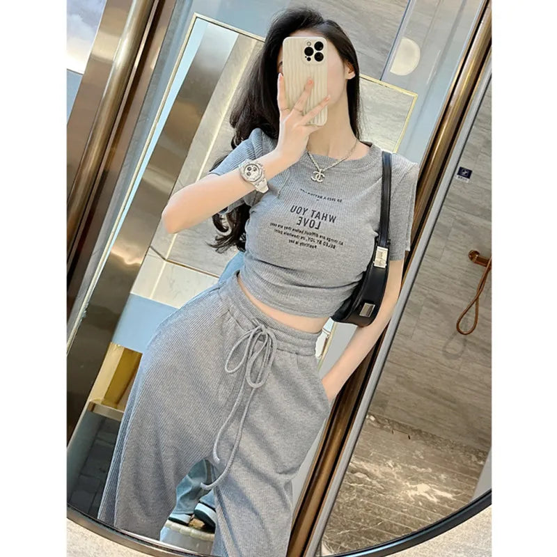Summer casual sports style spicy girl sexy short sleeved top+fashionable wide leg pants two-piece set