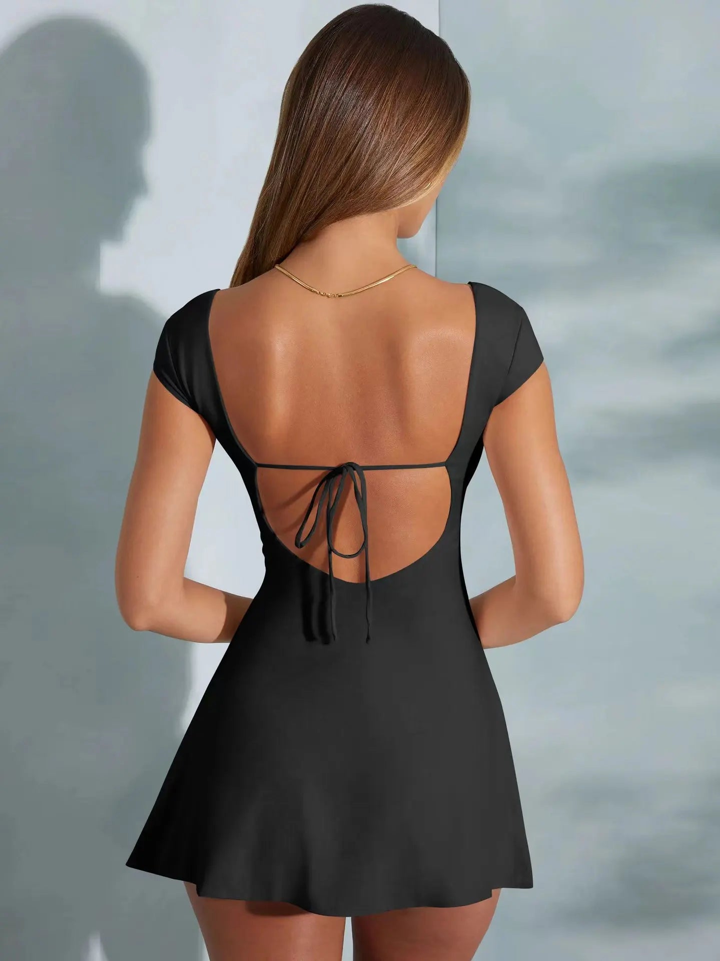 Fashionable and sexy summer women's minimalist style short-sleeved backless A-line skirt high-end pure and lustful dress