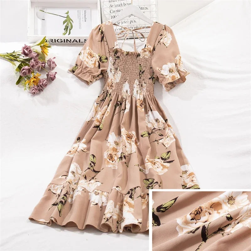 Beige floral chiffon dress for women with smocked elastic waist, A-line skirt, and short puff sleeves.