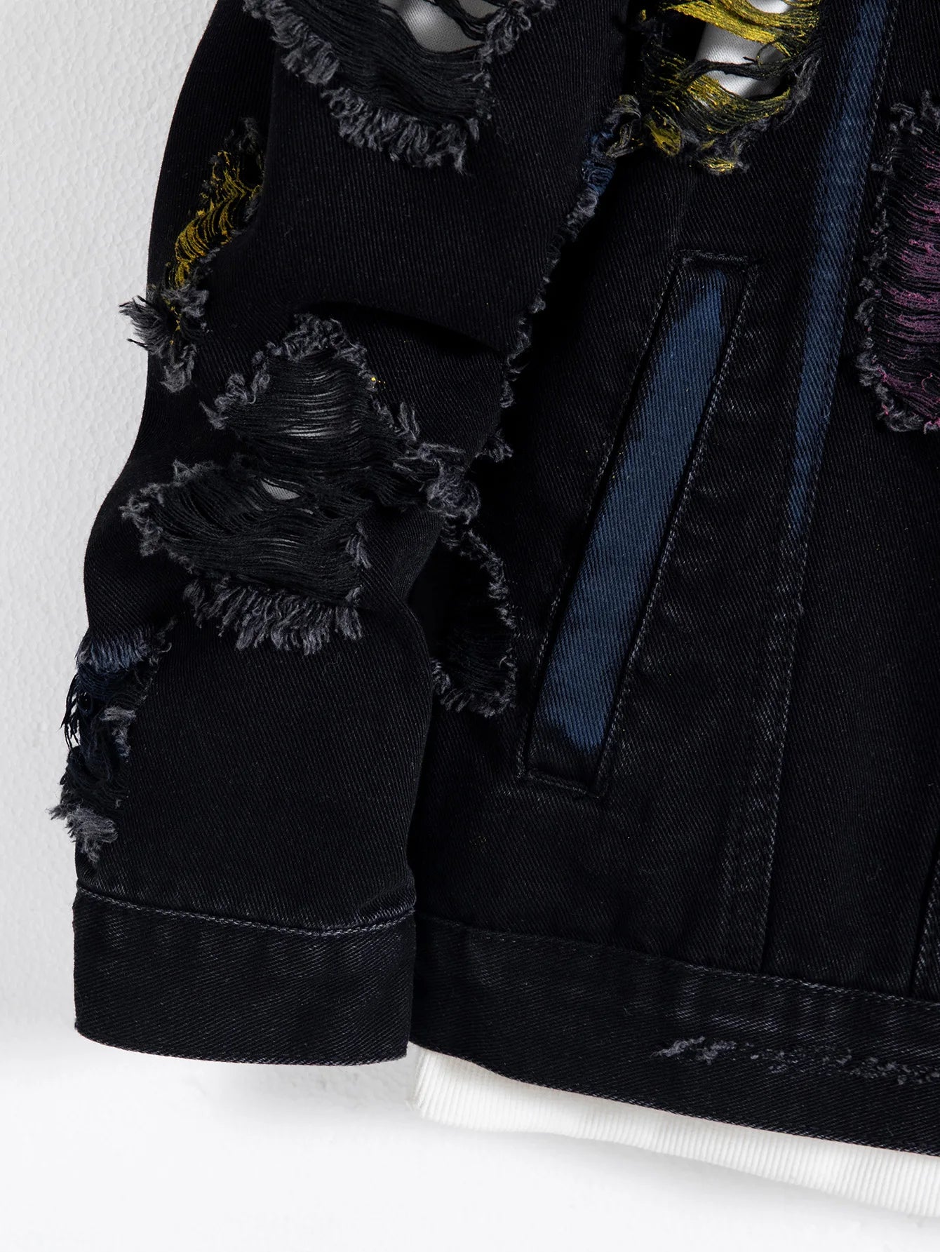 Men's black ripped denim jacket for spring and autumn. Random paint splashing.
