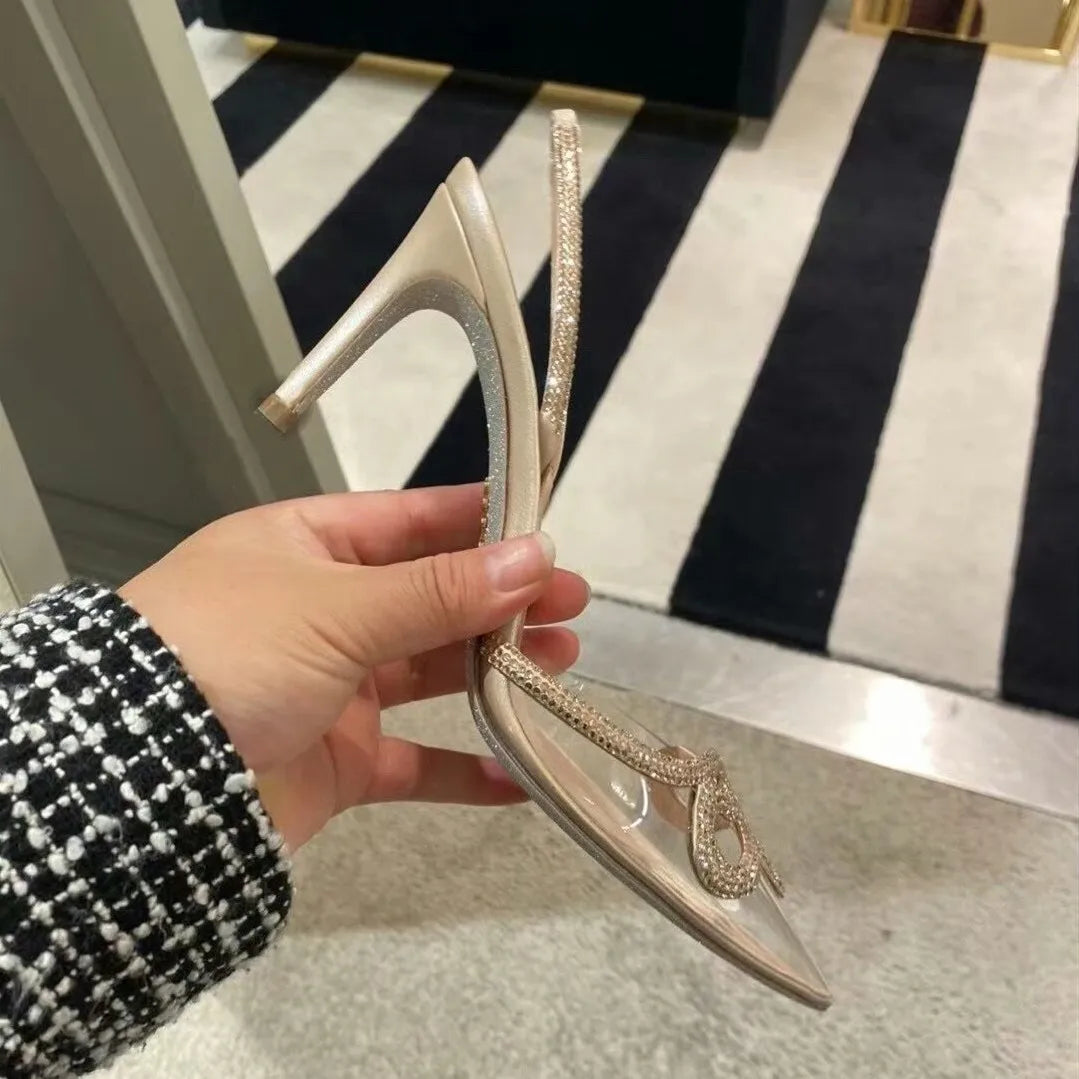 2024 Spring and Summer New Rhinestone High Heels Women's Thin Heels Pointed Sandals Transparent One-word Buckle Bag Head Shoes