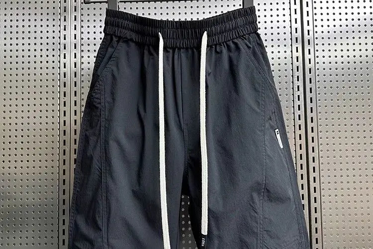Summer Fashion New Men Breathable Casual Trousers Loose Tying Feet Versatile Simple Solid Color Harem Pants