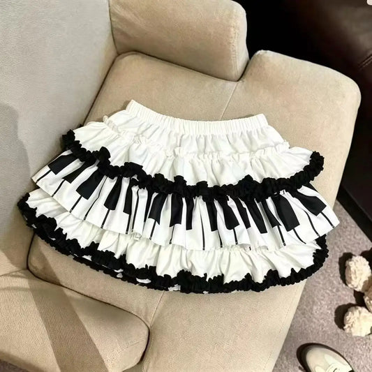 Y2K Black White Print Mini Skirt Women Slim Design Ruffle Layered A Line Skirt Elastic Waist Harajuku Pleated Short Piano Skirts