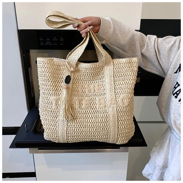 Straw woven bag, women's new versatile large capacity commuting tote bag, fashionable and stylish vacation bag