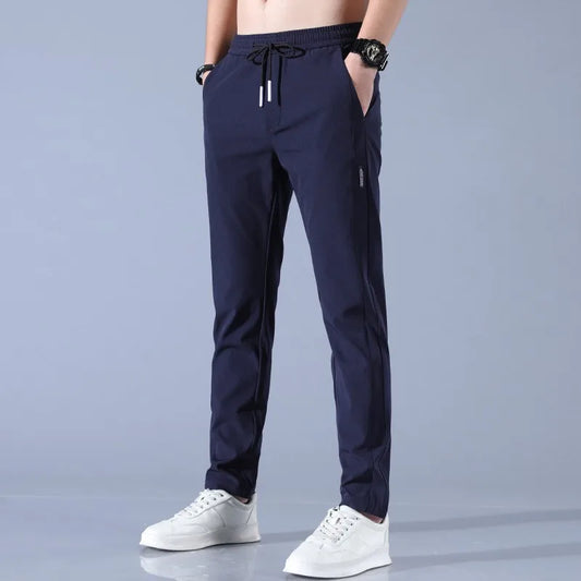 Pants Men 2024 Summer Ice Silk Casual Pants Men Straight Loose Elastic Thin Style Quick Dry Youth Sports Breathable Pants ﻿