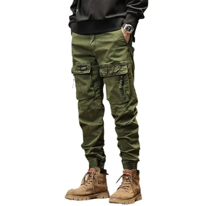 The new men's American retro sporty design in 2025 features multi-pocket, versatile drawstring work pants and stretch trousers