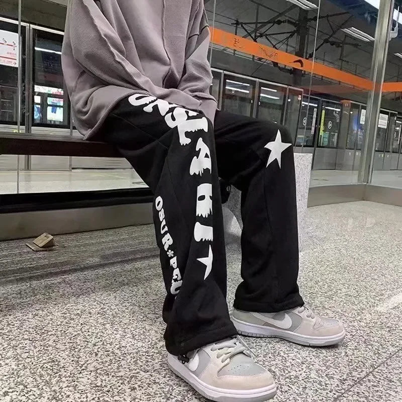 Men's Fashion Cool Lightweight Sweatpants Solid Color Joggers Printing Men Baggy Pants Streetwear Long Trousers Men Versatile