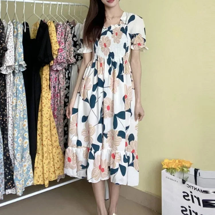 Bazaarhubo floral chiffon midi dress with elastic waist, short puff sleeves in white, blue and peach print