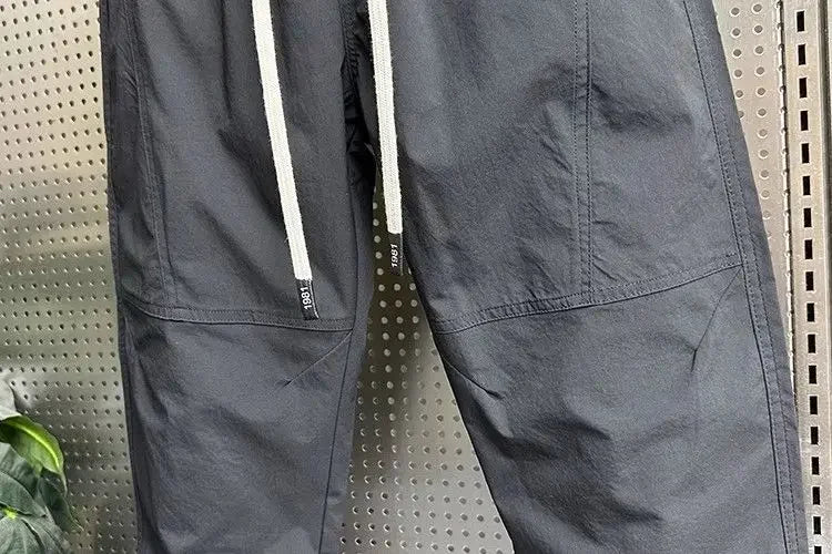 Summer Fashion New Men Breathable Casual Trousers Loose Tying Feet Versatile Simple Solid Color Harem Pants
