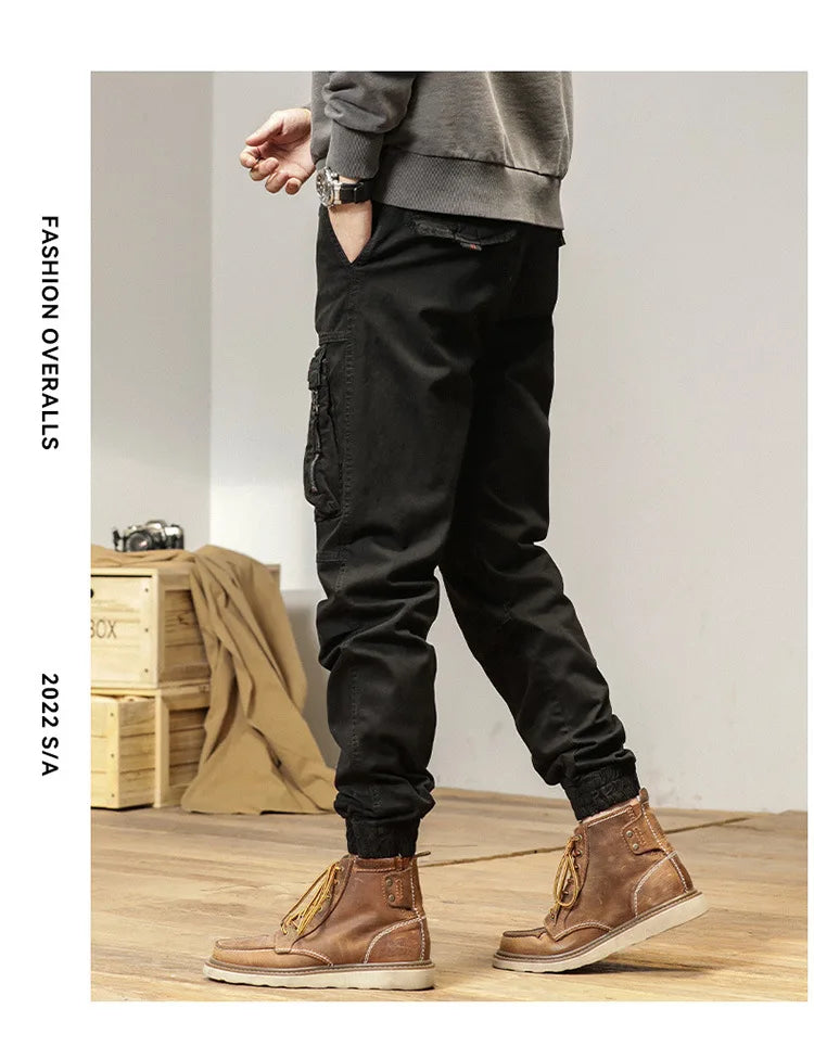 The new men's American retro sporty design in 2025 features multi-pocket, versatile drawstring work pants and stretch trousers