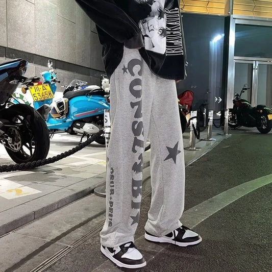 Men's Fashion Cool Lightweight Sweatpants Solid Color Joggers Printing Men Baggy Pants Streetwear Long Trousers Men Versatile