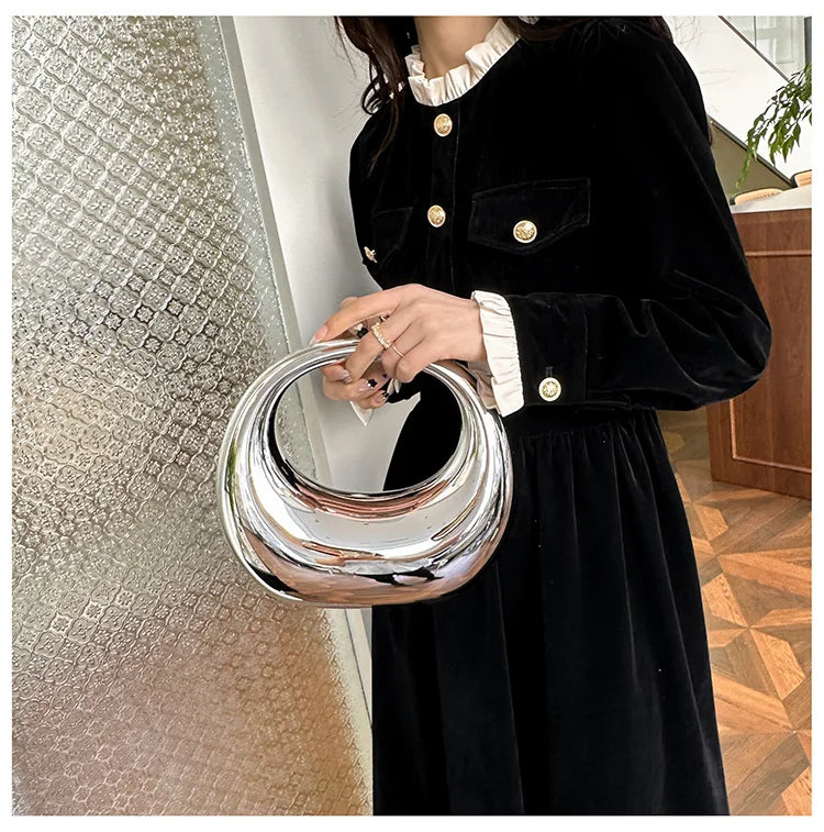 Hot Selling Creative Design Women's Top-Handle Bag PVC Metallic Luster Half Moon Banquet Women's Bag 2026 New Luxury Handbag