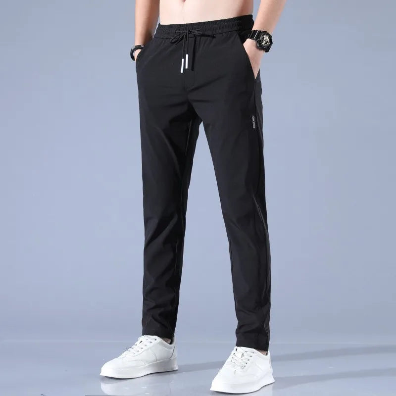 Pants Men 2024 Summer Ice Silk Casual Pants Men Straight Loose Elastic Thin Style Quick Dry Youth Sports Breathable Pants ﻿