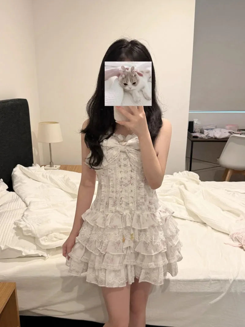 White lace Lolita two-piece set with bow and tiered ruffle mini skirt