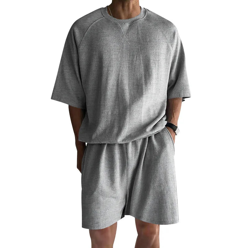 New 2026 Summer Men's Two Piece Sets Casual Loose Short Sleeve O Neck Tees and Shorts Tracksuits Men Stylish Solid Color Suits