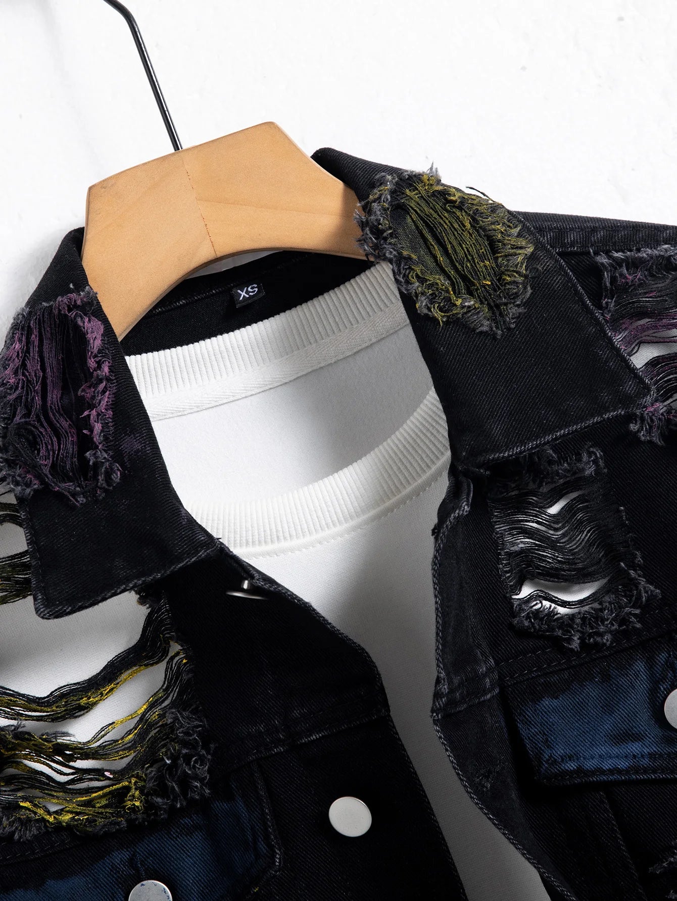 Men's black ripped denim jacket for spring and autumn. Random paint splashing.