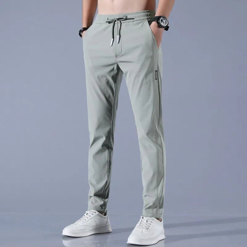 Pants Men 2024 Summer Ice Silk Casual Pants Men Straight Loose Elastic Thin Style Quick Dry Youth Sports Breathable Pants ﻿