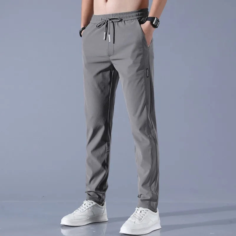 Pants Men 2024 Summer Ice Silk Casual Pants Men Straight Loose Elastic Thin Style Quick Dry Youth Sports Breathable Pants ﻿