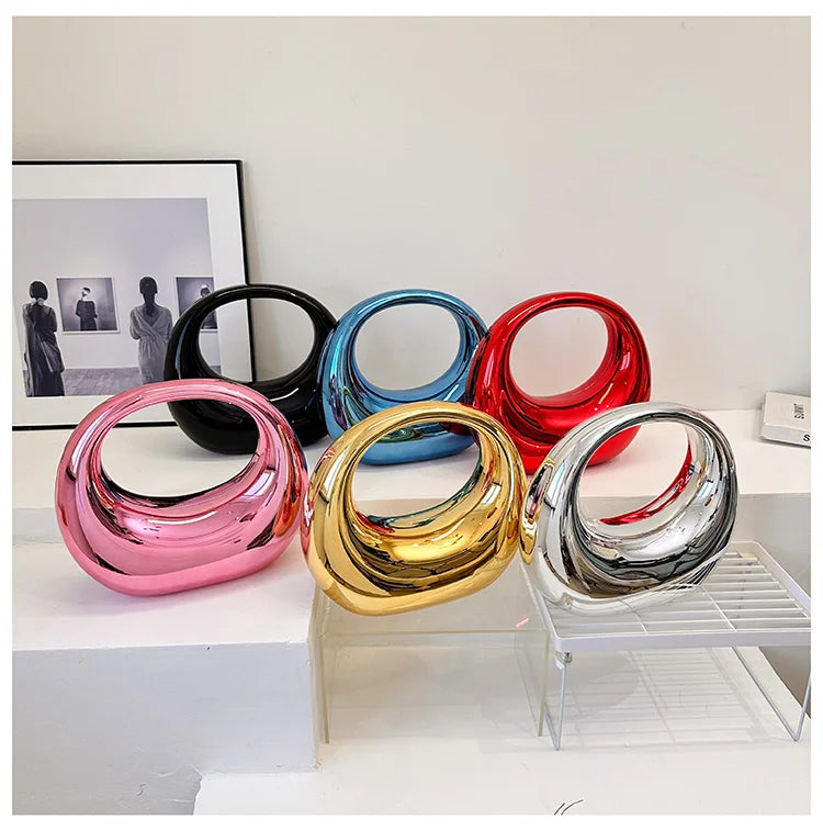 Hot Selling Creative Design Women's Top-Handle Bag PVC Metallic Luster Half Moon Banquet Women's Bag 2026 New Luxury Handbag