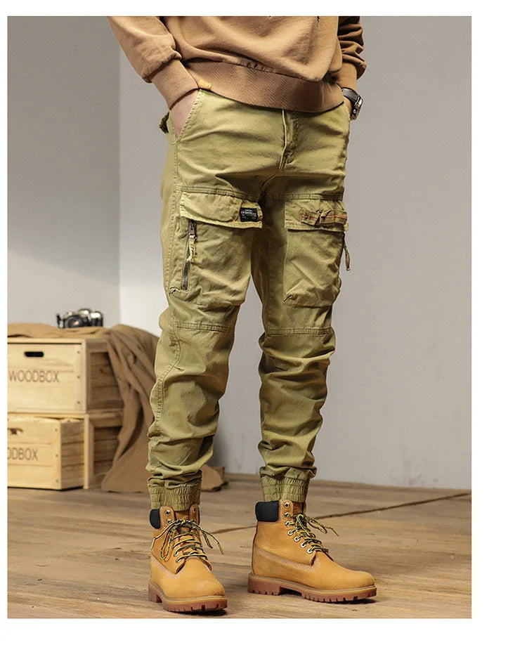 The new men's American retro sporty design in 2025 features multi-pocket, versatile drawstring work pants and stretch trousers