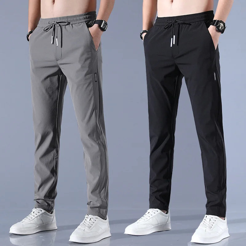 Pants Men 2024 Summer Ice Silk Casual Pants Men Straight Loose Elastic Thin Style Quick Dry Youth Sports Breathable Pants ﻿