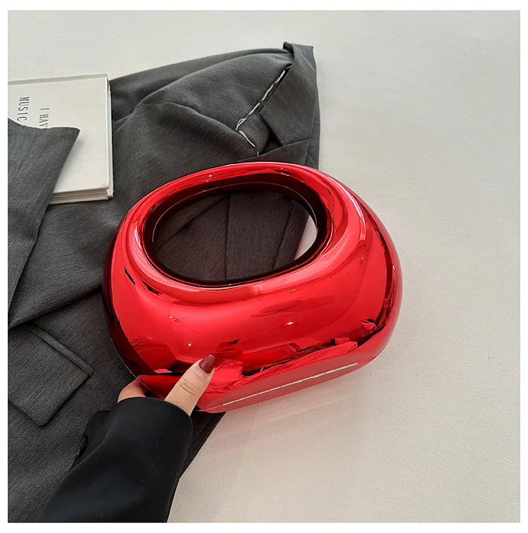 Hot Selling Creative Design Women's Top-Handle Bag PVC Metallic Luster Half Moon Banquet Women's Bag 2026 New Luxury Handbag