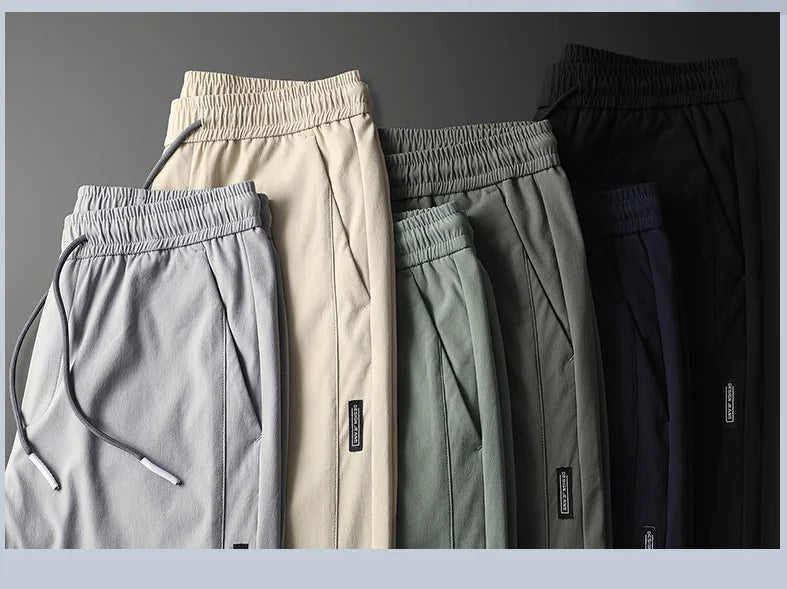 Pants Men 2024 Summer Ice Silk Casual Pants Men Straight Loose Elastic Thin Style Quick Dry Youth Sports Breathable Pants ﻿