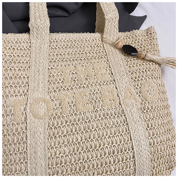 Straw woven bag, women's new versatile large capacity commuting tote bag, fashionable and stylish vacation bag