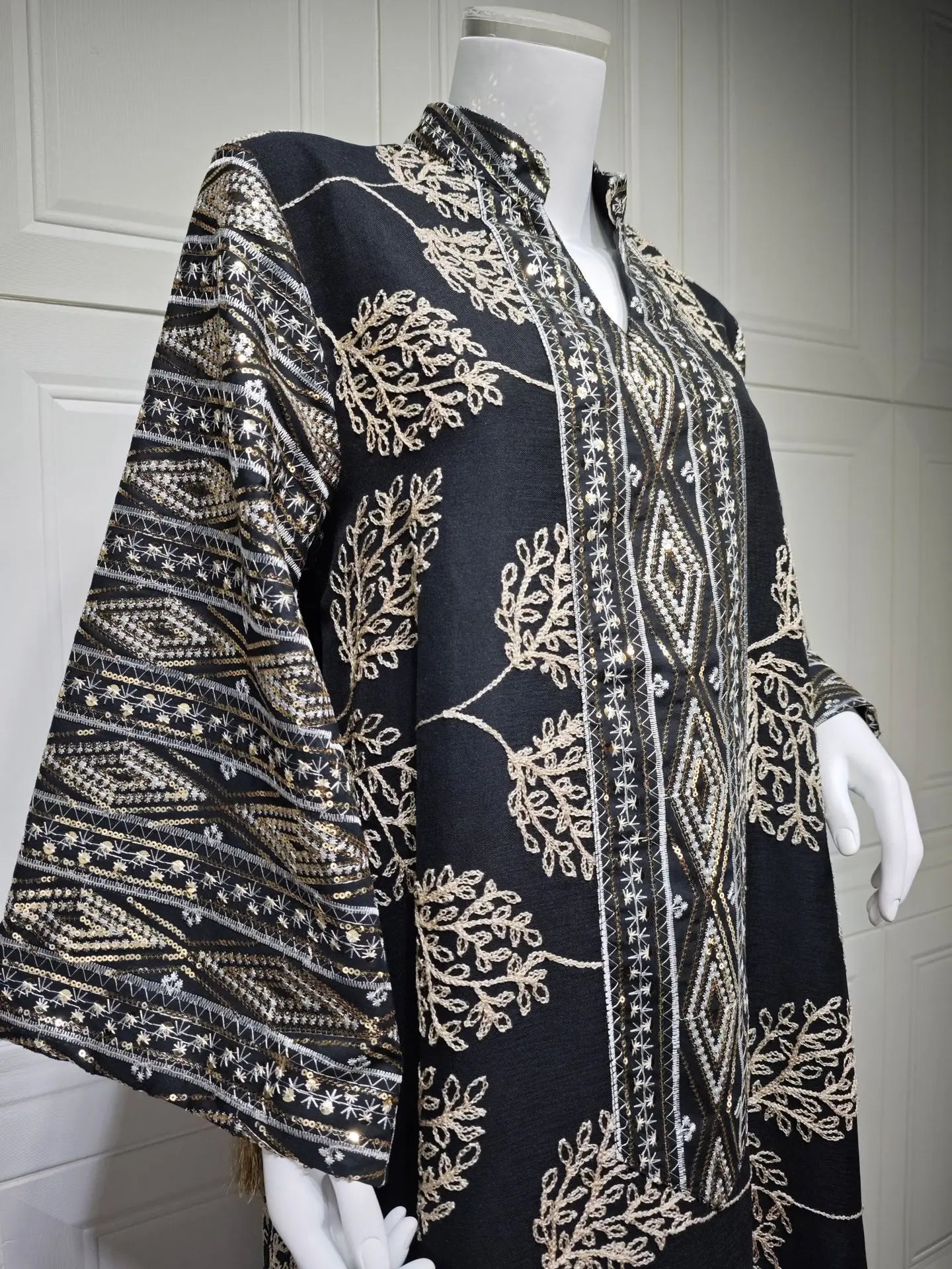 Elegant Light Green Abaya for Islamic Ladies Intricate Gold Embroidery and Tassel Accents Perfect for Festivities in Middle East
