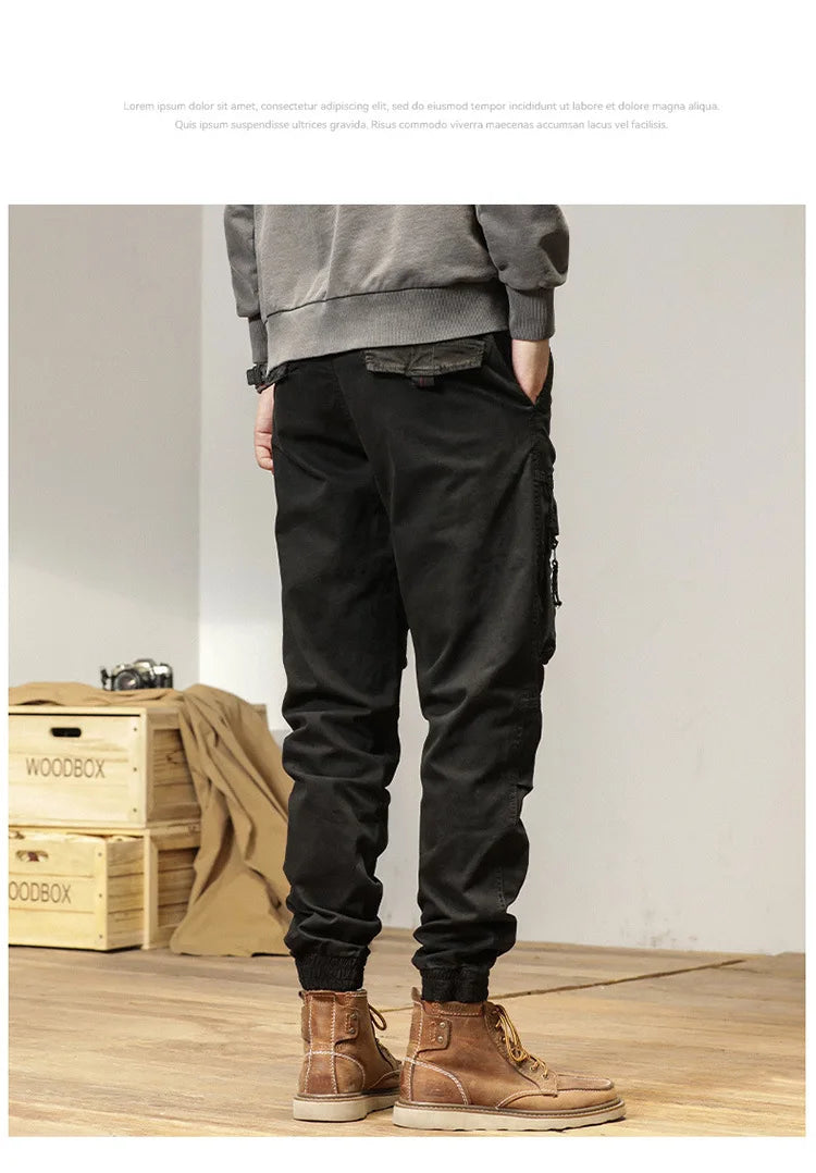The new men's American retro sporty design in 2025 features multi-pocket, versatile drawstring work pants and stretch trousers