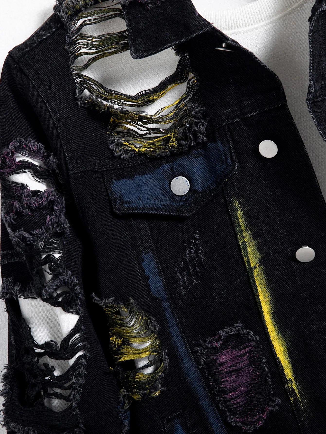 Men's black ripped denim jacket for spring and autumn. Random paint splashing.
