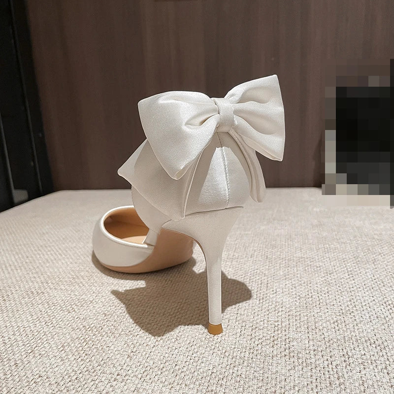 2022 New Solid Color Fashion Design Stiletto Bow Hollow Women's Wedding Shoes Women's Exquisite Shallow Mouth Satin High Heels
