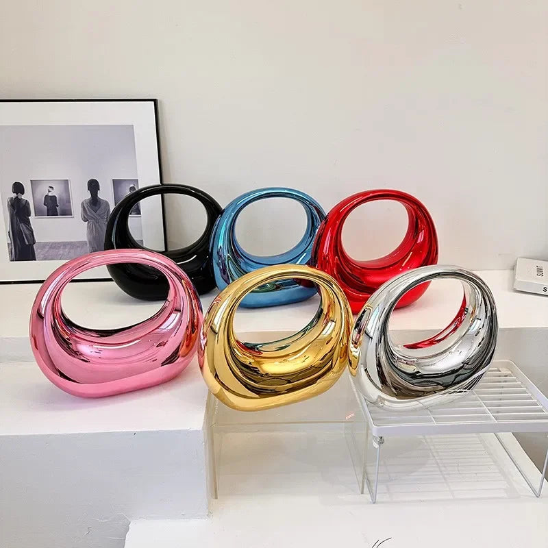 Hot Selling Creative Design Women's Top-Handle Bag PVC Metallic Luster Half Moon Banquet Women's Bag 2026 New Luxury Handbag