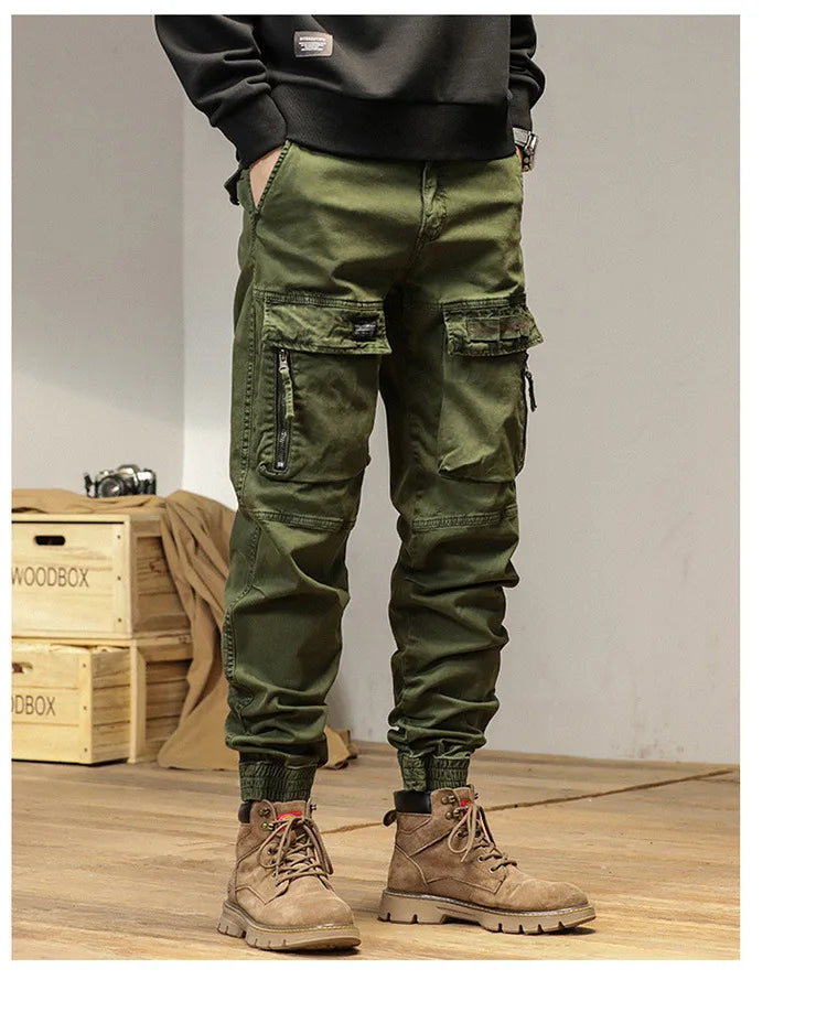 The new men's American retro sporty design in 2025 features multi-pocket, versatile drawstring work pants and stretch trousers