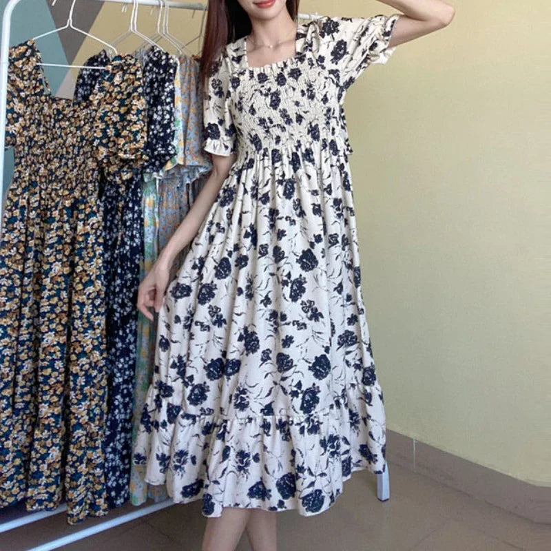 Women's chiffon dress with navy floral print, elastic waist, short sleeves, A-line silhouette