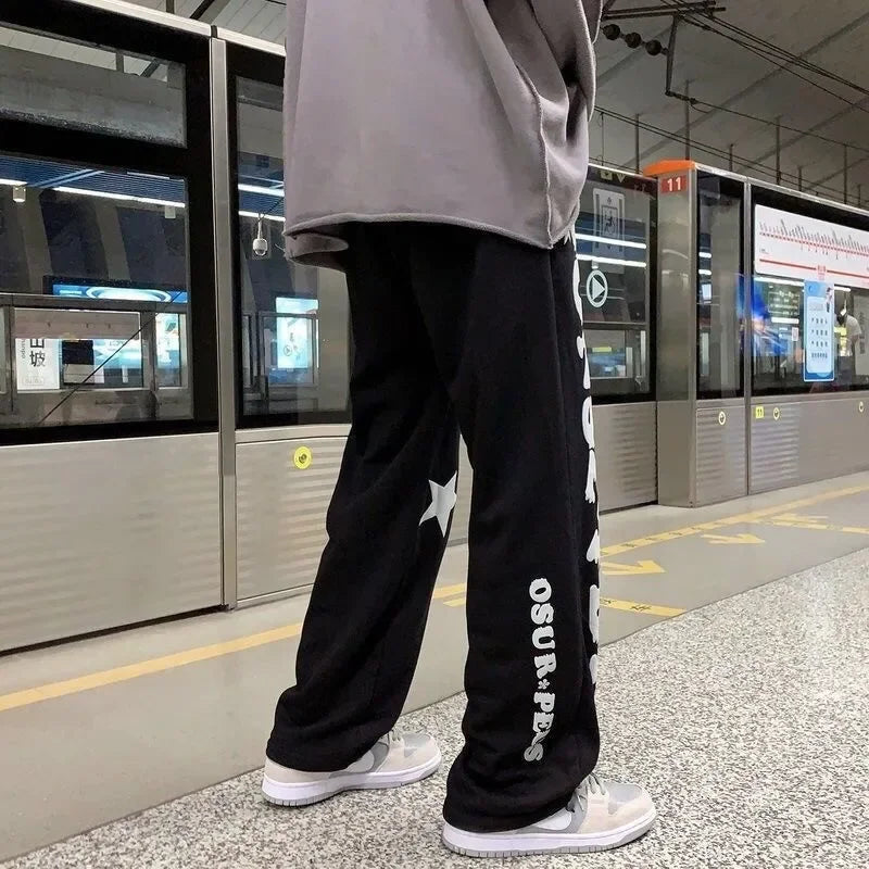 Men's Fashion Cool Lightweight Sweatpants Solid Color Joggers Printing Men Baggy Pants Streetwear Long Trousers Men Versatile
