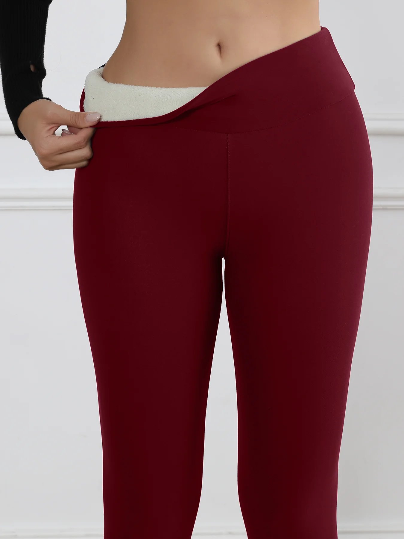 Fleece-lined burgundy high-waisted thermal leggings for women with tummy control.