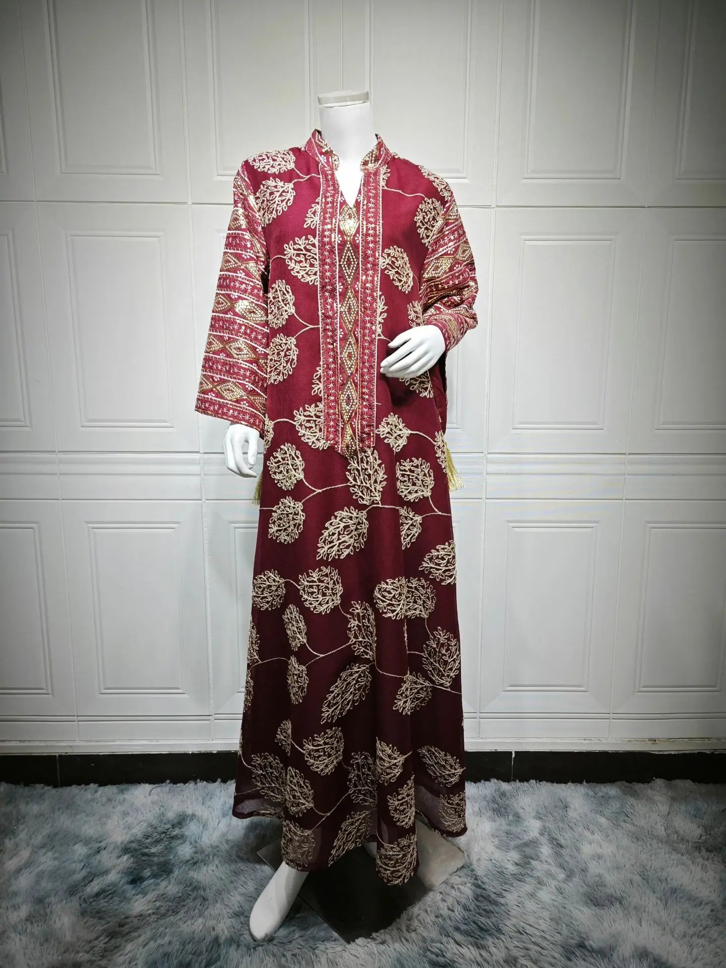 Elegant Light Green Abaya for Islamic Ladies Intricate Gold Embroidery and Tassel Accents Perfect for Festivities in Middle East