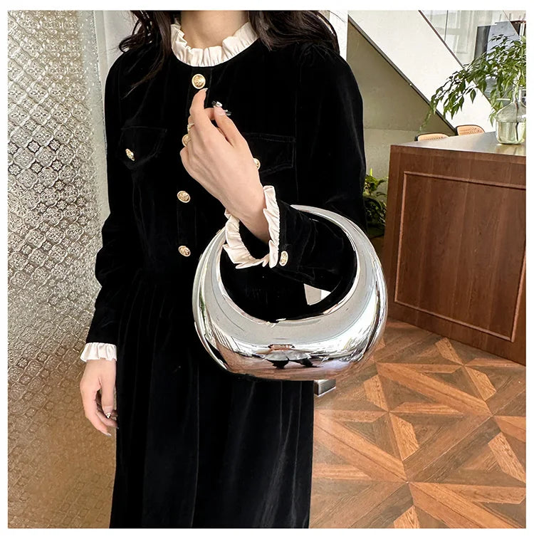 Hot Selling Creative Design Women's Top-Handle Bag PVC Metallic Luster Half Moon Banquet Women's Bag 2026 New Luxury Handbag